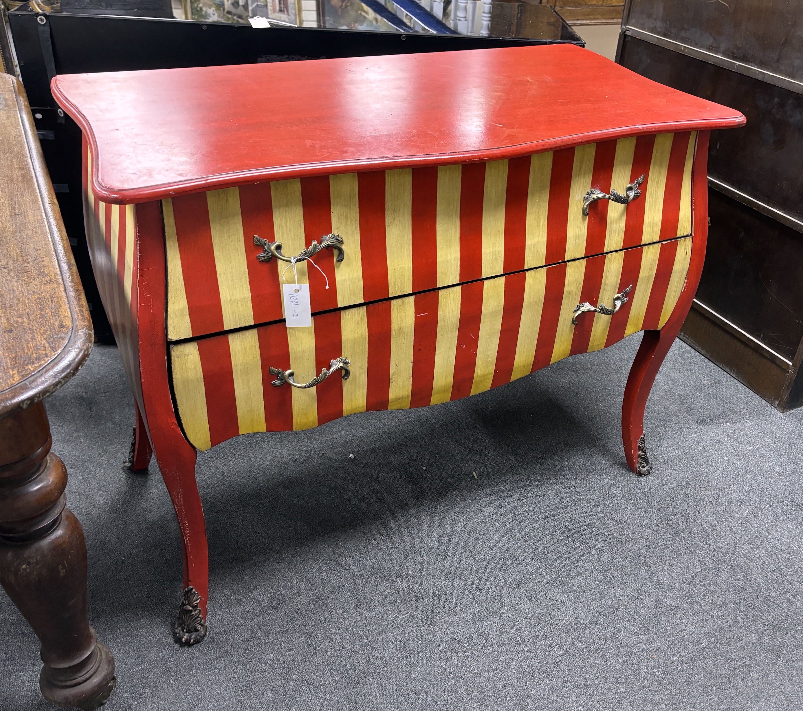 A contemporary Continental style painted serpentine commode, width 105cm, depth 52cm, height 83cm